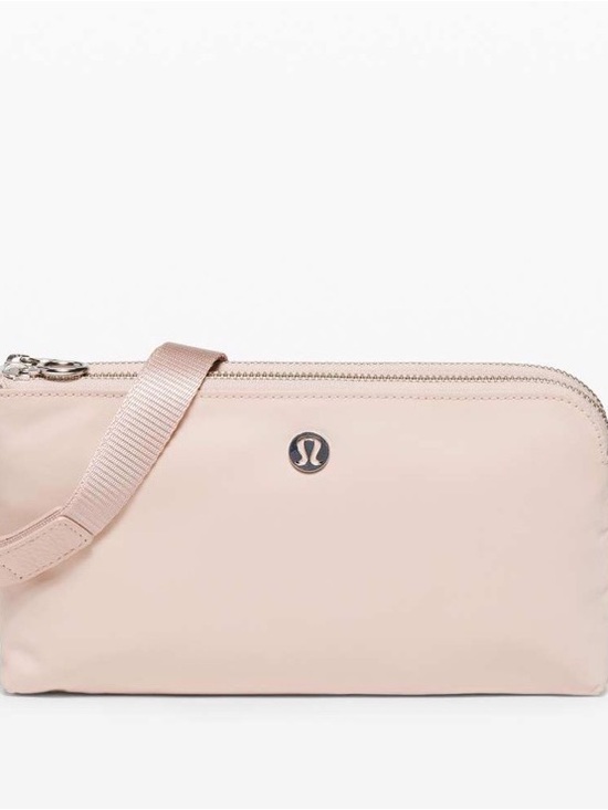 lululemon athletica Handbags - RARE Lululemon Now & Always Pouch Misty Shell Blush Pink Wristlet Sold Out